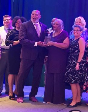 Cocoa City Council, Diamond Square CRA Board Members and staff accepting the award at the FRA Confer