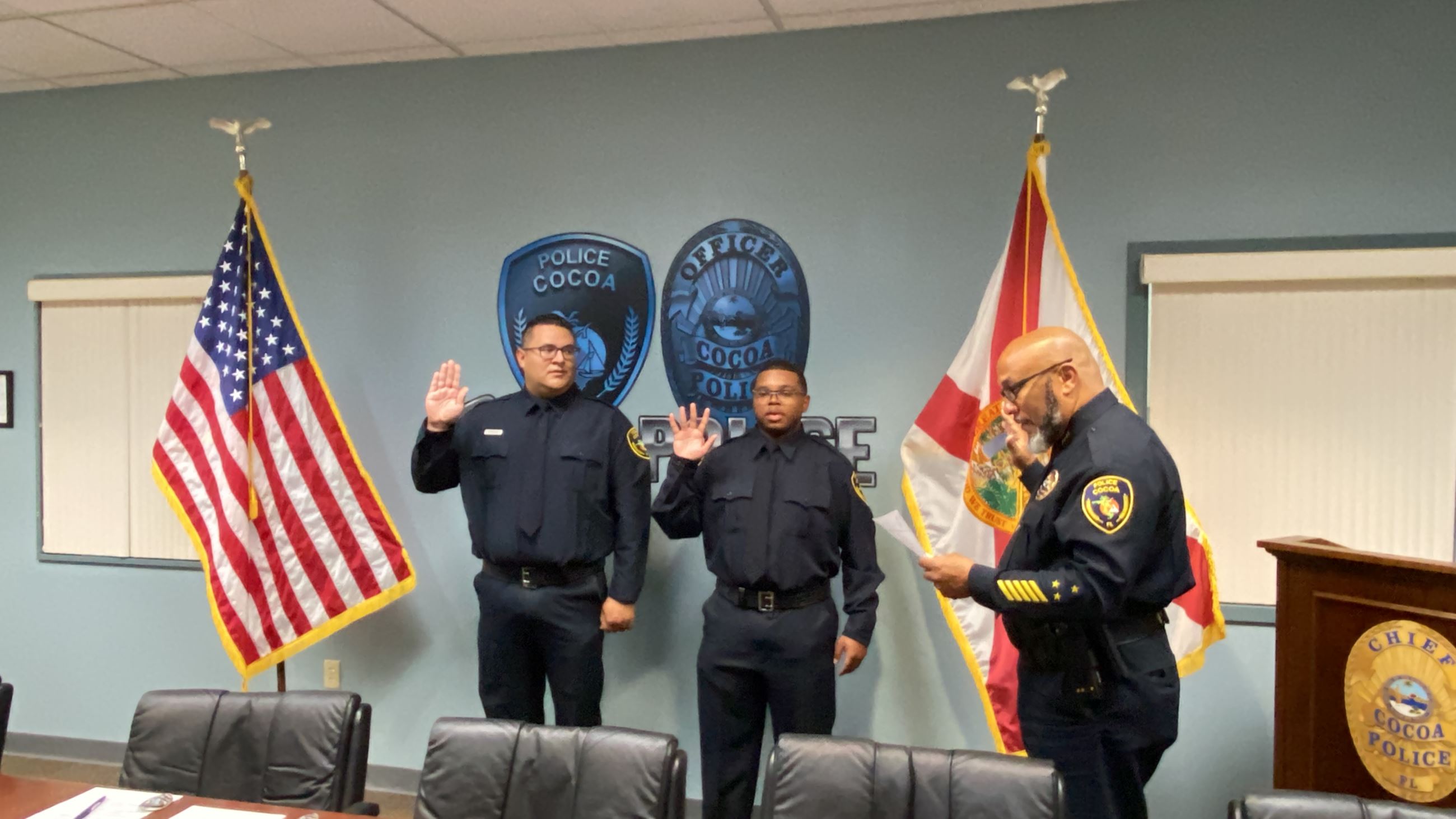 Photo of Chief Collier Swearing in Two New Officers